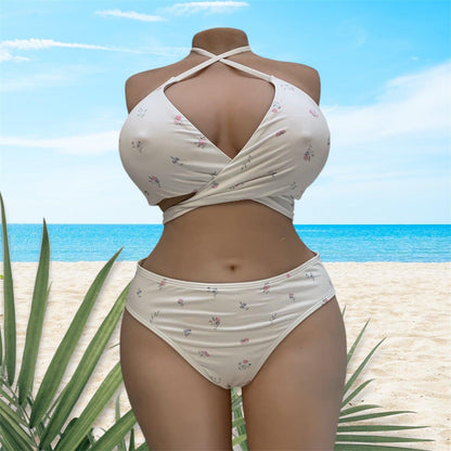 Torso doll Tantaly wearing a white bikini with floral pattern. Elegance and sensuality guaranteed!